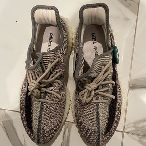 Brand new Yeezy size 9 for men size 10 for women. cream, brown and gray